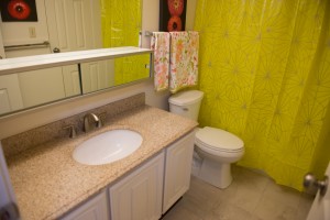 Bathroom with Granite Countertops and Tile Floor